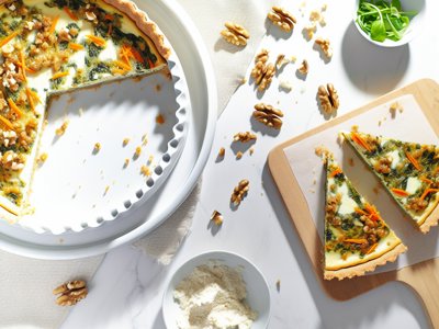 Frühlings-Bärlauch-Ziegenkäse-Quiche mit Rüebli-Walnuss-Boden